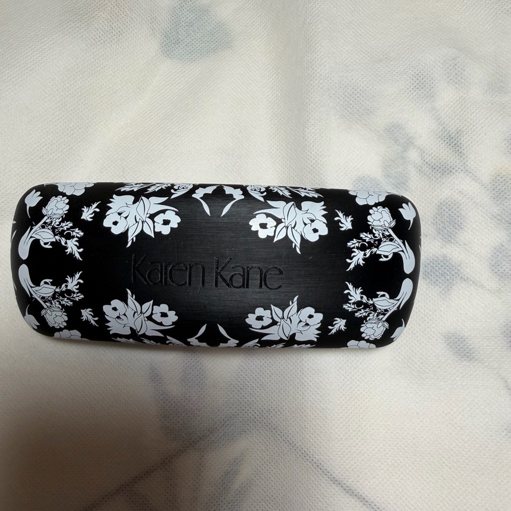 Karen Kane Black Case with White Floral Design